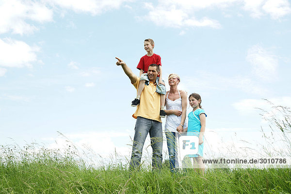 Family on a meadow  low angle view