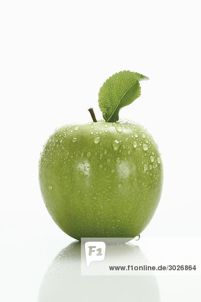 Grüner Apfel mit Blatt