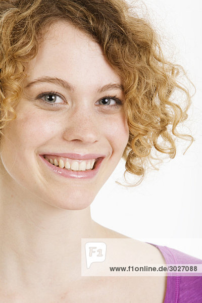 Young woman smiling  portrait  close-up