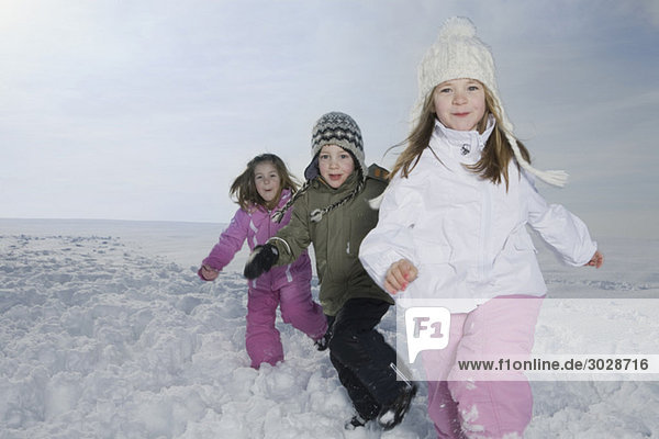 Germany  Bavaria  Munich  Children in snowy landscape