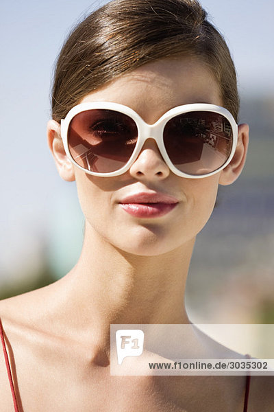 Fashion model wearing sunglasses