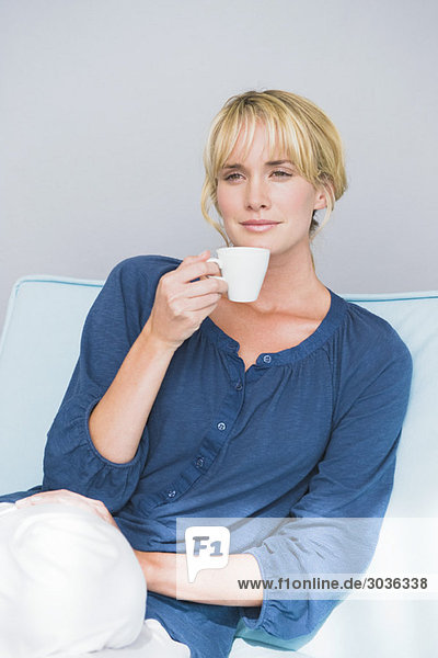 Woman holding a cup of tea