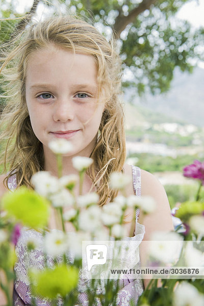 Portrait eines Mädchens mit Blumen