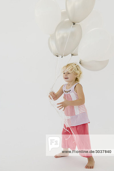 Mädchen mit Luftballons