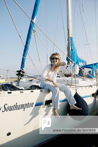 Woman Relaxing on Sailing Boat