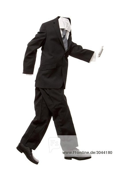 A male business suit with a phone