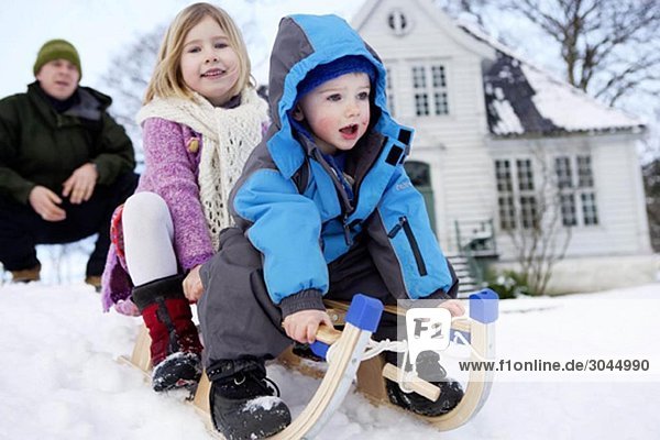 Scandinavian children on a sled