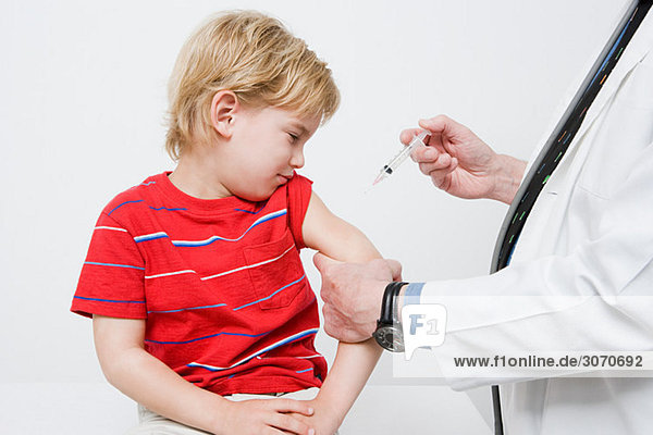 Boy getting immunization