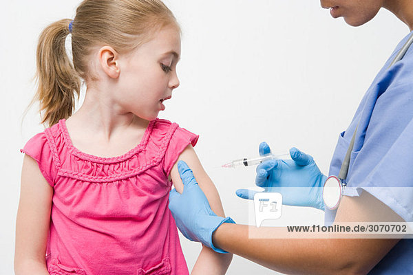 Girl getting immunization