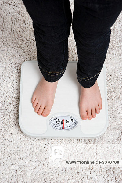 Child on weight scales