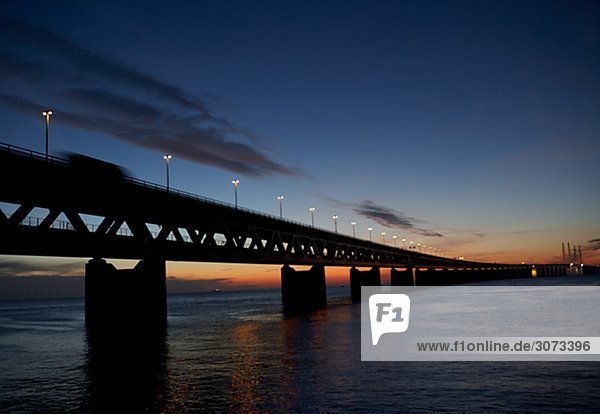 Oresund bridge by night Skane Sweden.