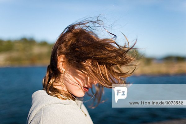 A girl with wind in her hair Sweden.