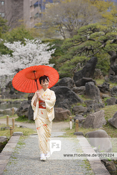 Japanese Woman Holding Parasol