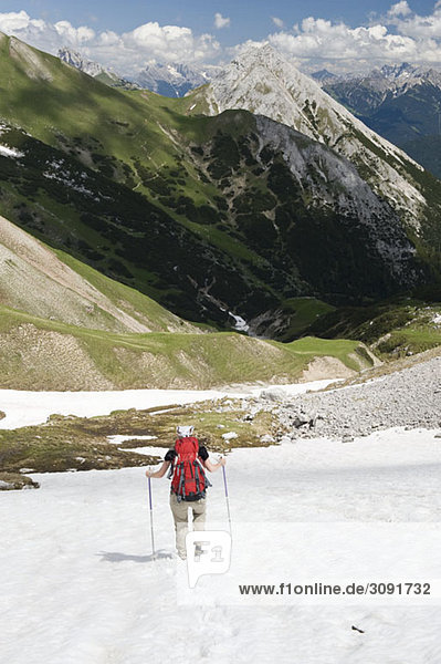 A woman hiking down one of The Wetterstein mountains