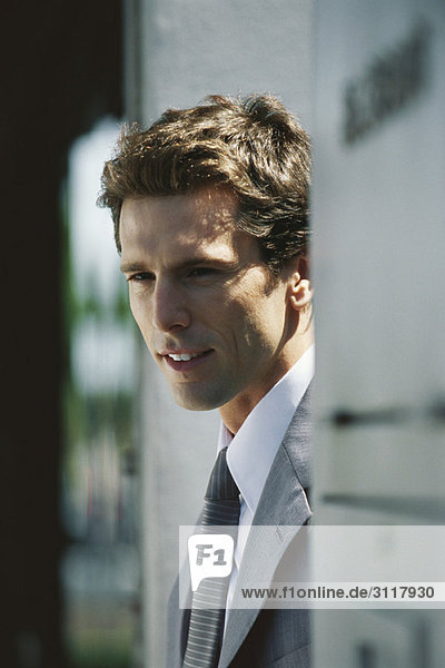 Businessman looking away thoughtfully  portrait
