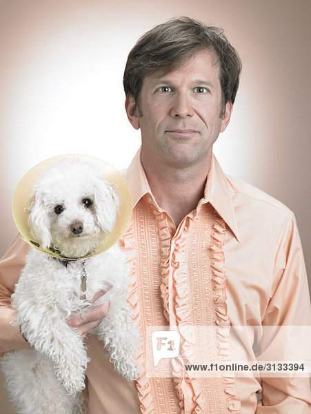 Man with pet poodle