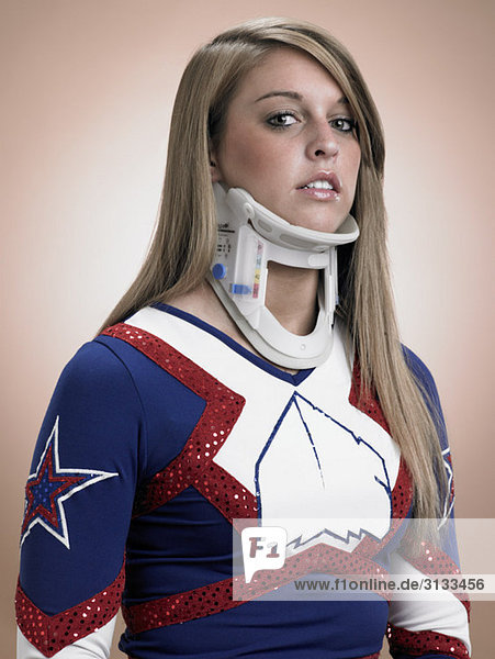 Cheerleader wearing a neck brace
