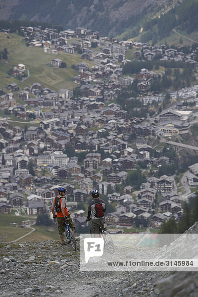 Mountain bikers resting in the alps