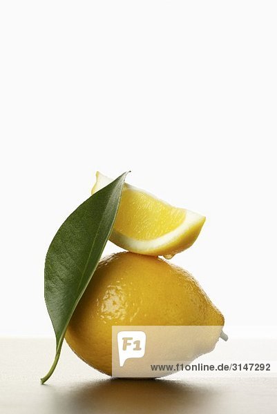 Lemon Slice on Whole Lemon with Leaf