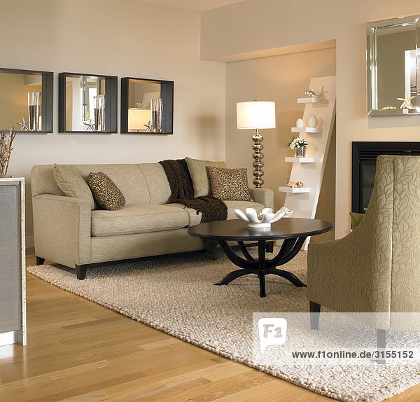 Beige living room with black coffee table  Victoria  British Columbia