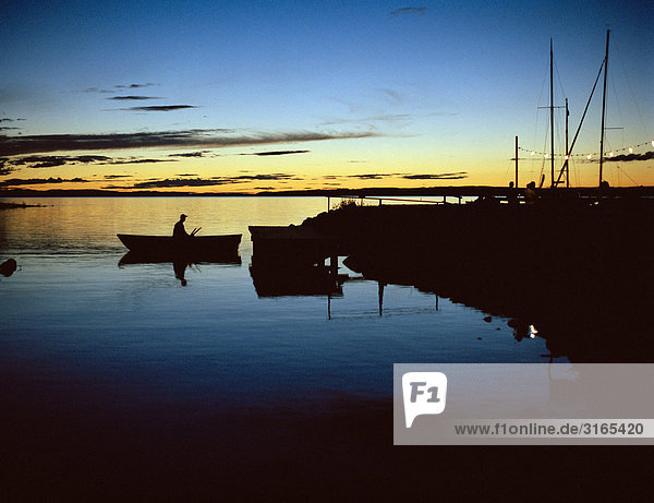 A row-boat at twilight  Dalarna  Sweden.