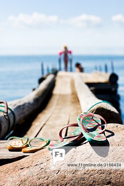 Flip-flops by a jetty Sweden.