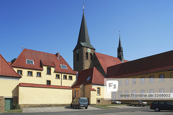Wohnhäuser und Kirche in Bersenbrück  Deutschland