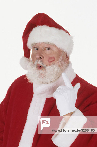 Weihnachtsmann mit Lippenstift auf der Wange  Portrait  Nahaufnahme