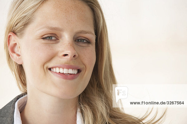 Young businesswoman laughing  portrait
