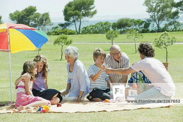 Spain  Mallorca  Family having picnic