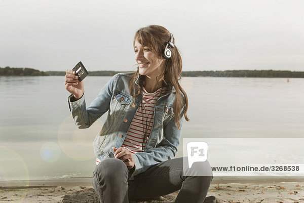 Lake Wannsee  Woman wearing headphones