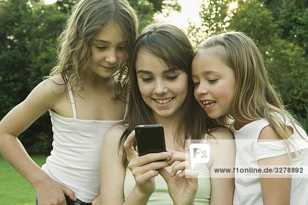 Girl's looking at photo on phone
