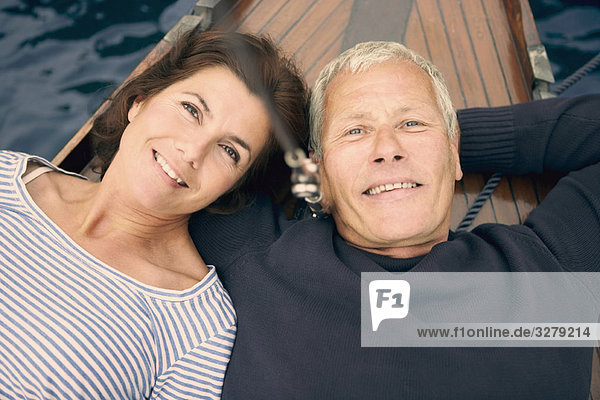 Middle aged couple on boat (portrait)