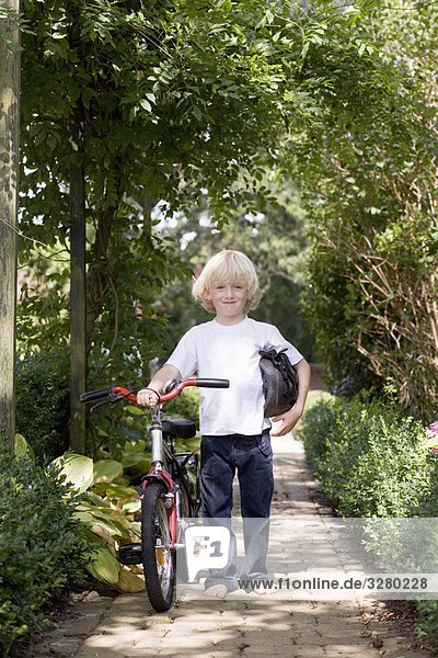 child with first bicycle