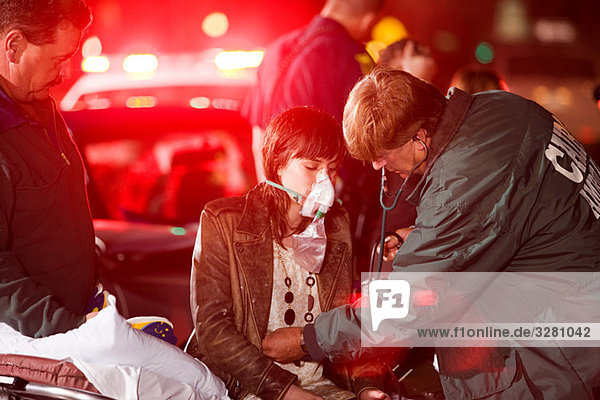 Young woman receiving medical attention