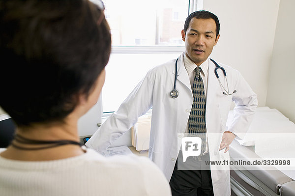 Doctor talking with patient in clinic examination room  Orangeville  Ontario