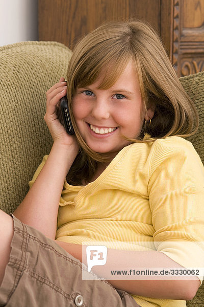 Young girl using iphone