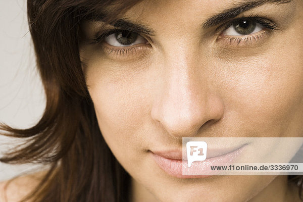 Young woman looking provocatively at the camera  portrait