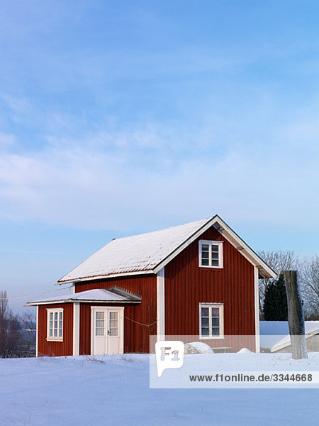 A red cottage  Sweden.