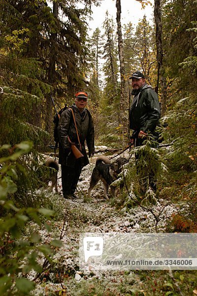 Men elk-hunting  Sweden.