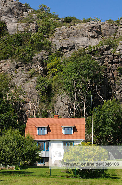 A house by a rock-face  Sweden.