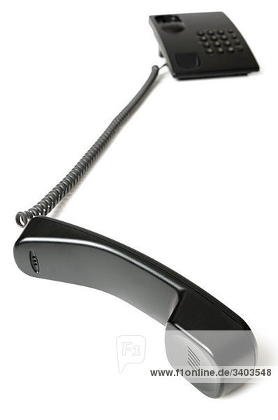 Telephone and Handset Against a White Background