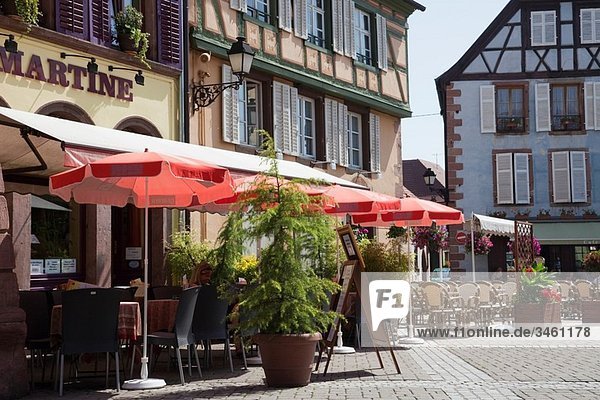 Ribeauville  Alsace  Haut-Rhin  France  Europe French pavement cafe outside medieval timbered buildings in picturesque town on the Alsatian wine route