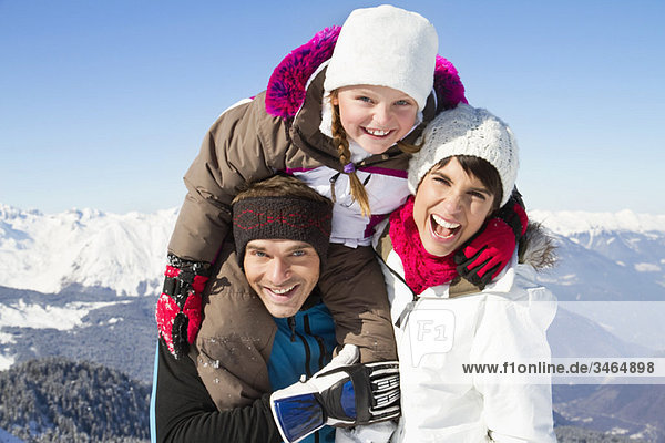 Happy family in snow