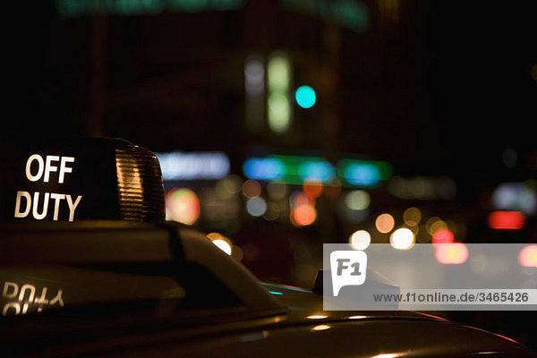 Detail of a taxi at night  New York City  USA