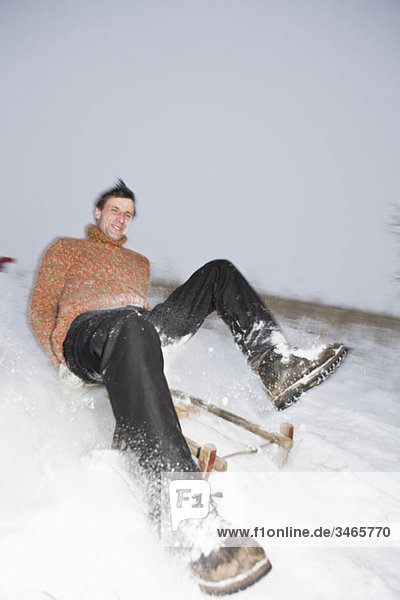 A man sledding