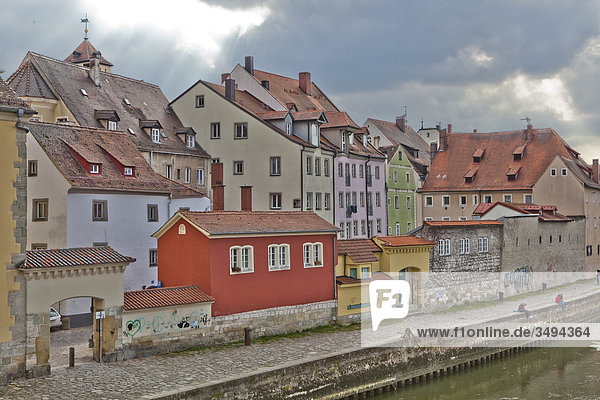 Buildings on the Danube riverbank in the old town of Regensburg  Germany  elevated view