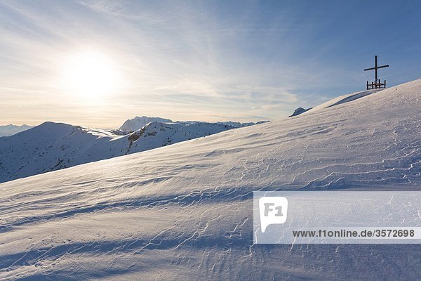 Summit cross above the Lammertal Tennengebirge Austria