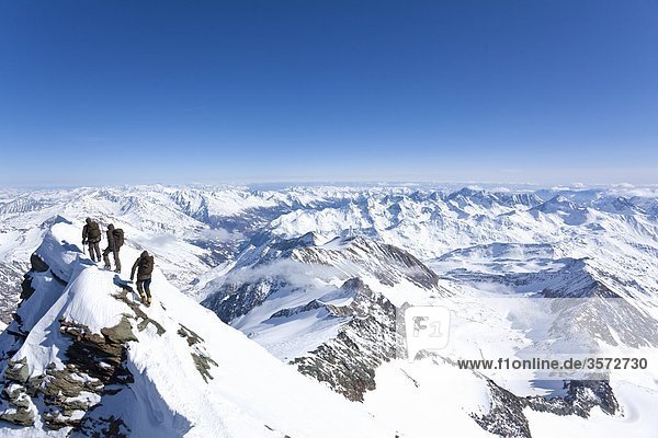 Three mountaineers descending the Grossglockner Austria