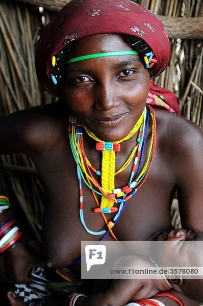 zemba mother with baby opuwo namibia